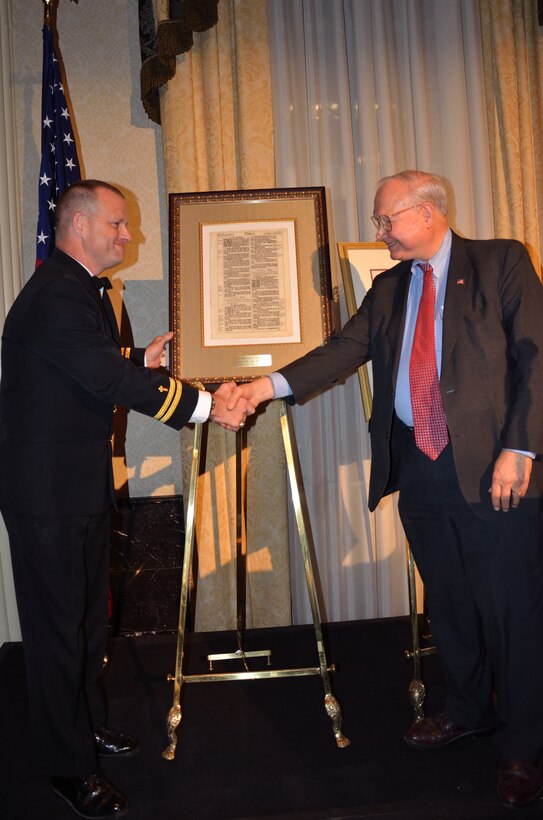 Navy Lt. Ray Rivers receives the 2011 United States Navy Witherspoon Award from Dr. John M. Templeton, president of The Templeton Foundation, at the National Bible Association Banquet at the Waldorf Astoria in New York City, recently.